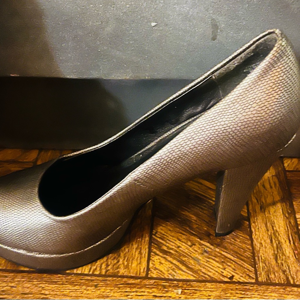 Brand new Madeline Silver 7.5 heels